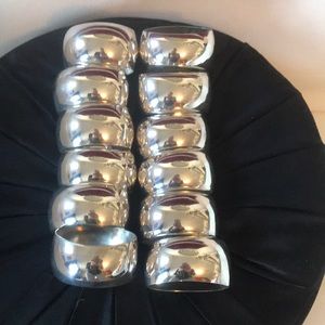 Set of 12 silver plated napkin rings.